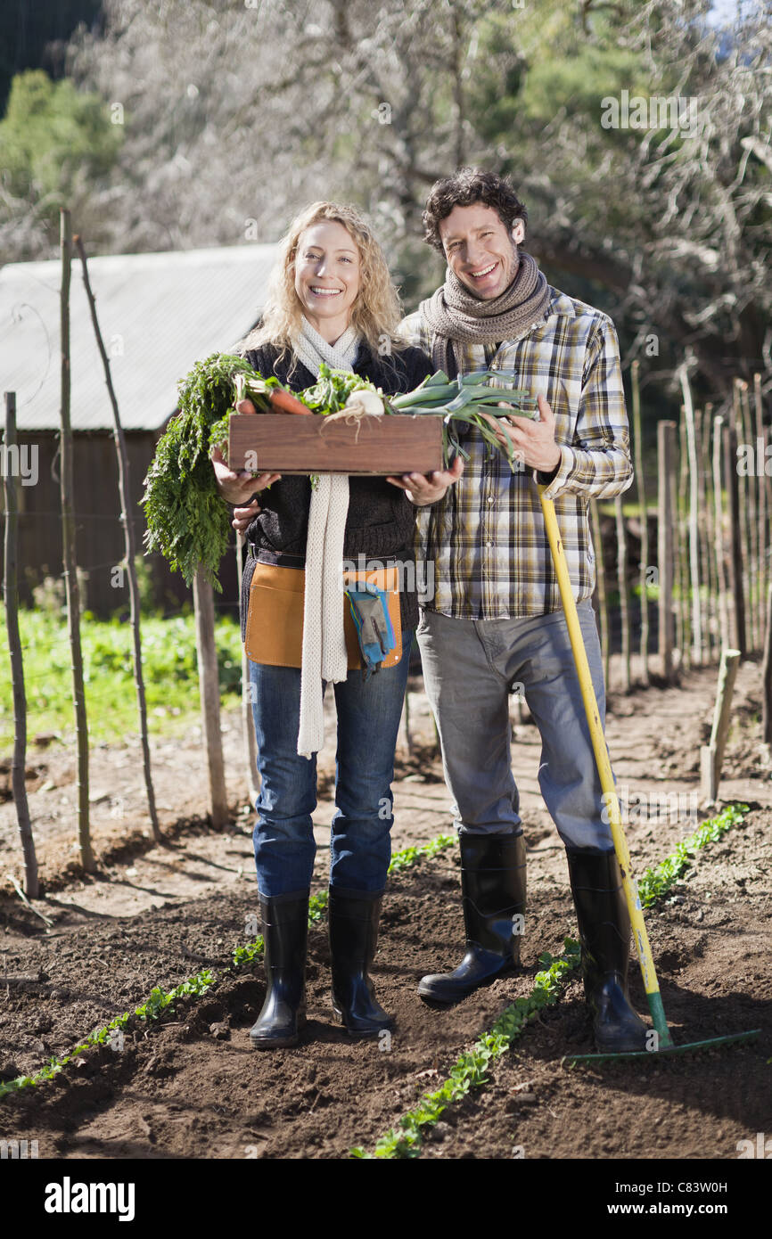 Couple picking vegetables in hi-res stock photography and images - Alamy