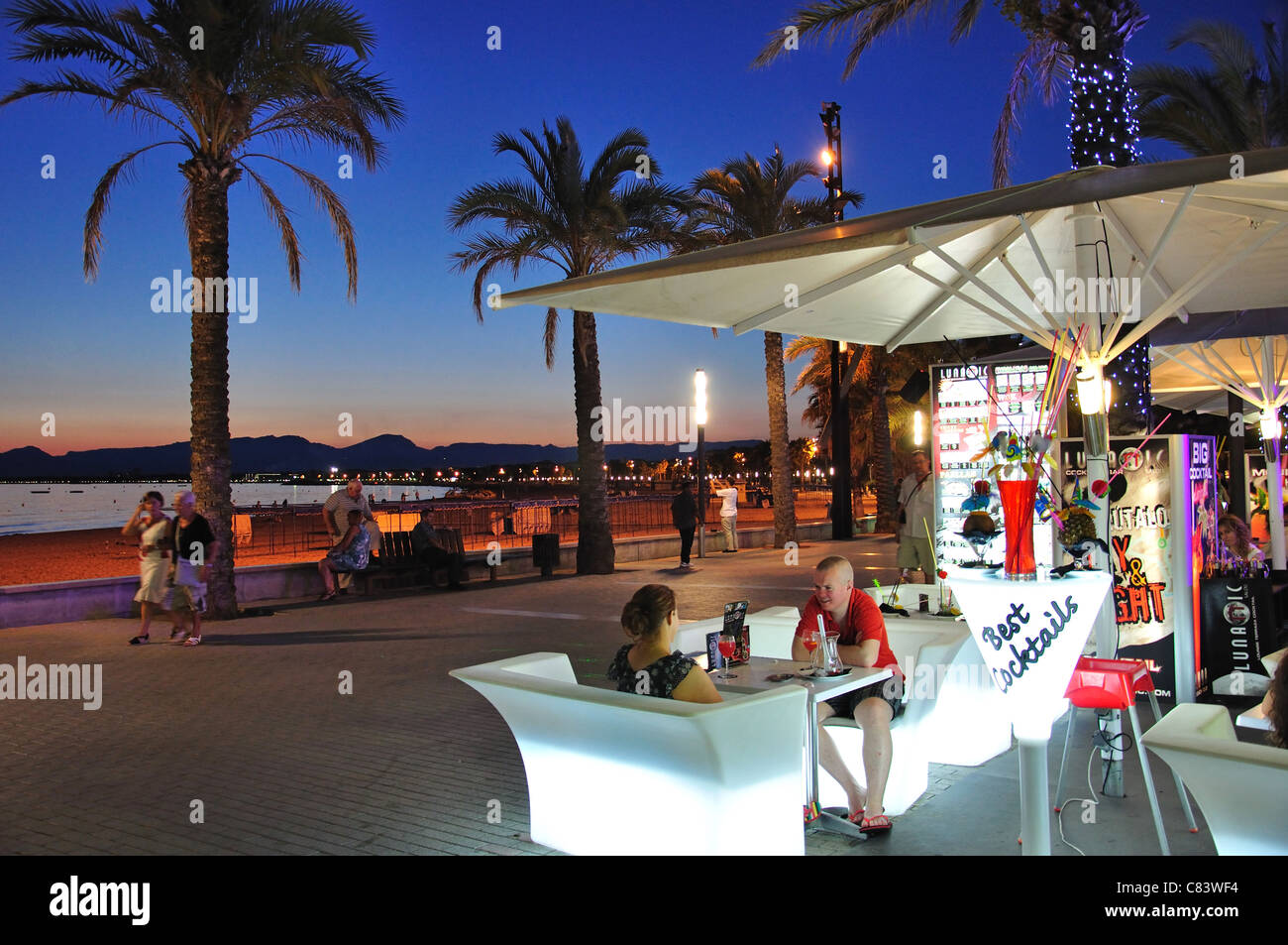 Beachfront bar at dusk, Platja de Llevant, Salou, Costa Daurada