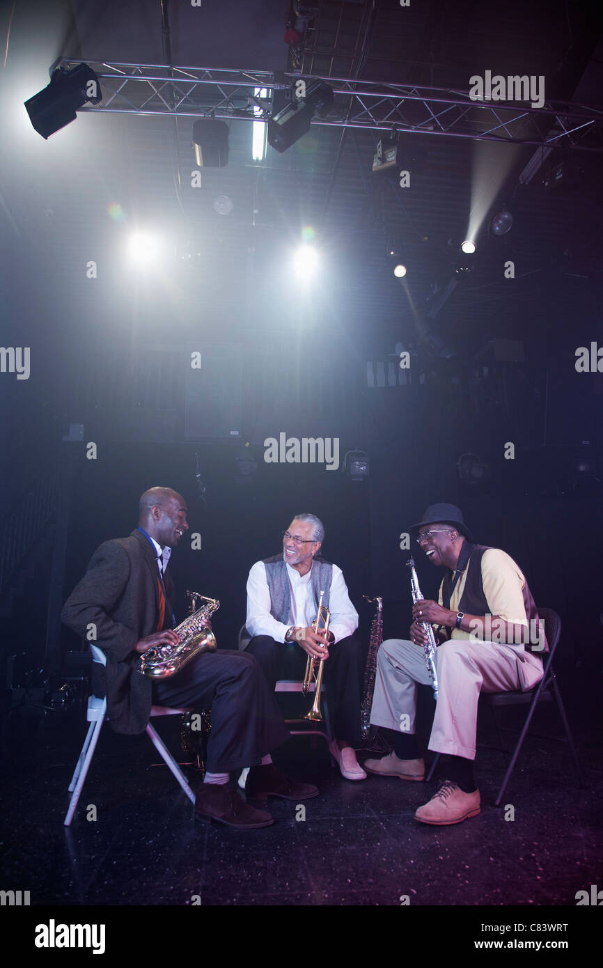 Musicians playing in jazz band on stage Stock Photo