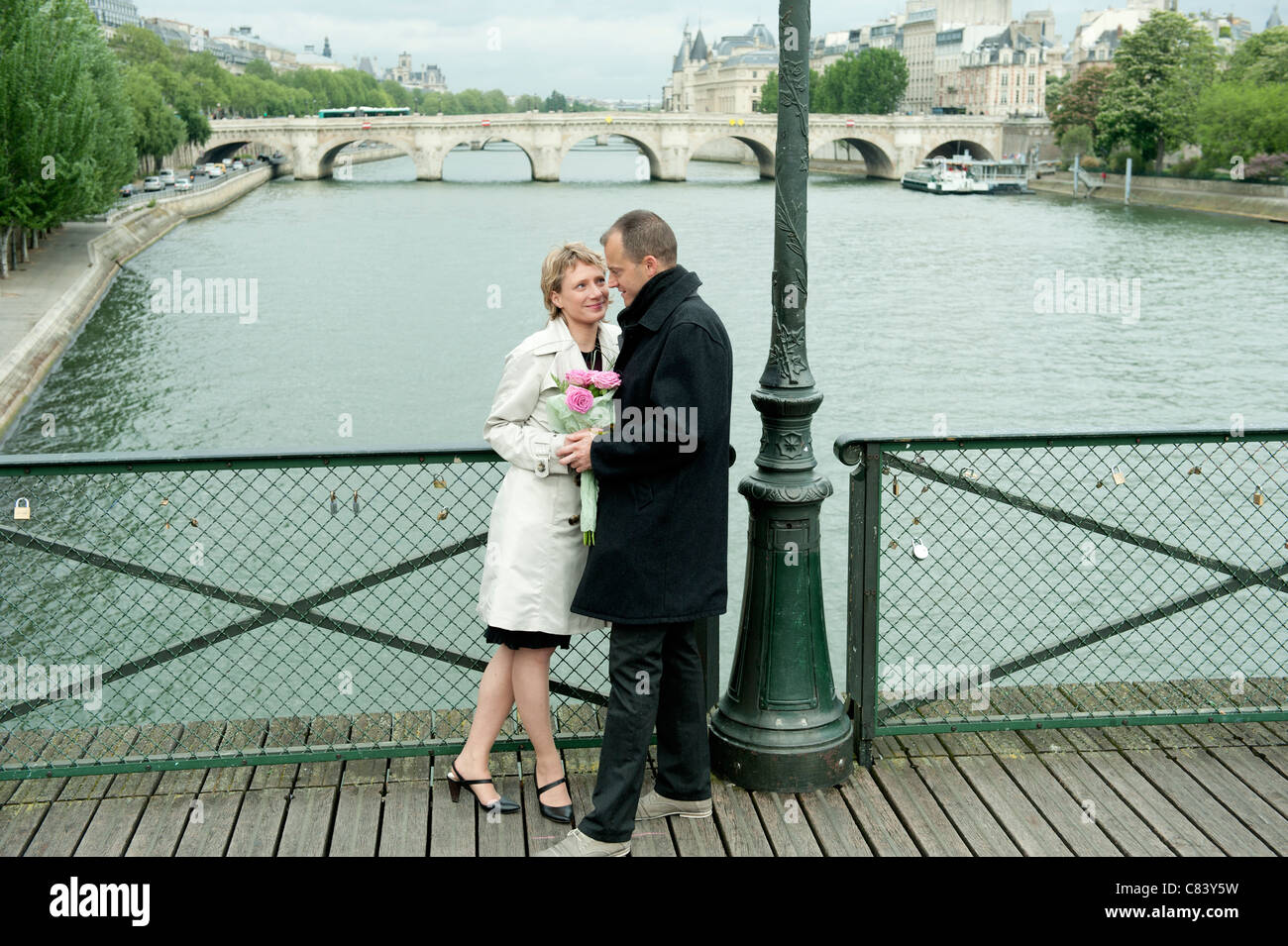 Couple standing face to face on bridge hi-res stock photography and ...