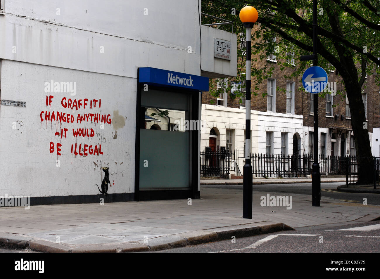 Banksy graffiti on a wall in Clipstone Street, central London Stock