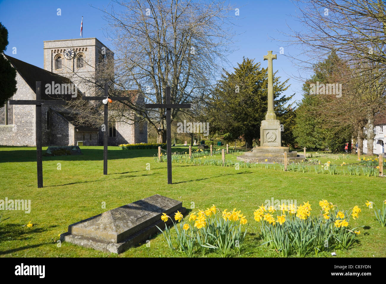 St Mary's Church and World war memorial cross, Kingsclere, Hampshire, England, UK Stock Photo