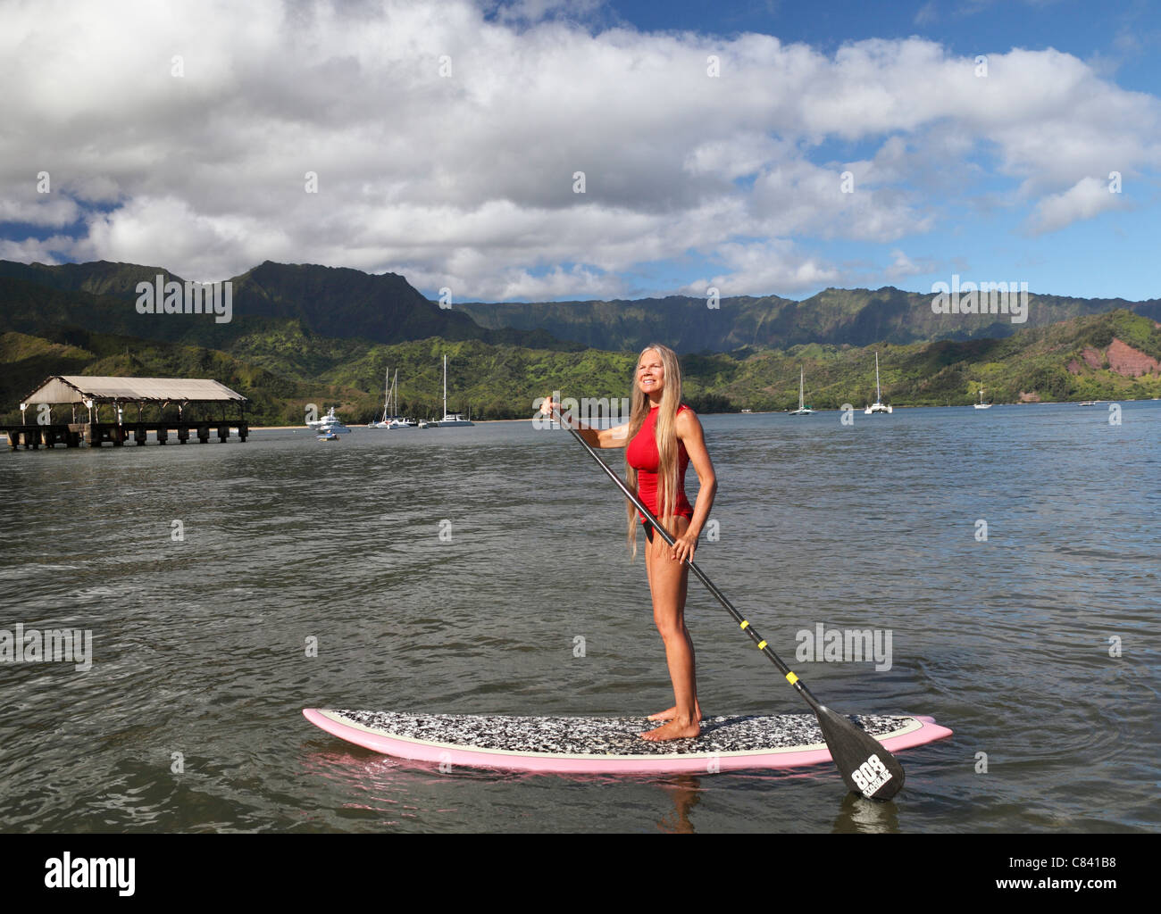 Stand up paddleboarder in Hanalei Bay on Kauai Stock Photo