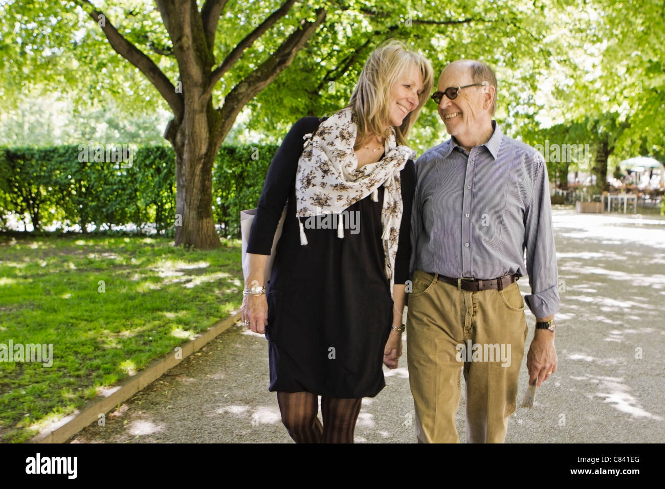 Two people walking hand in hand hi-res stock photography and images - Alamy
