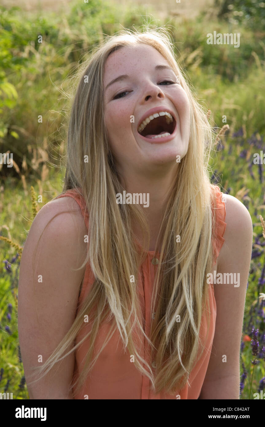 Teenage Girl Laughing Outdoors Stock Photo   Alamy