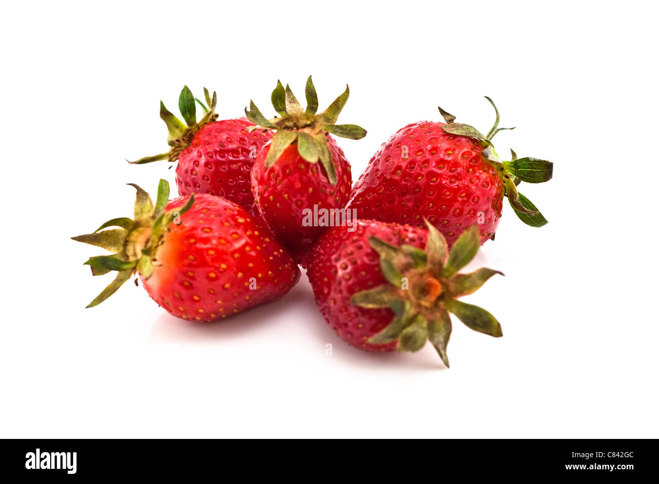 Fresh red strawberries isolated on white background Stock Photo - Alamy