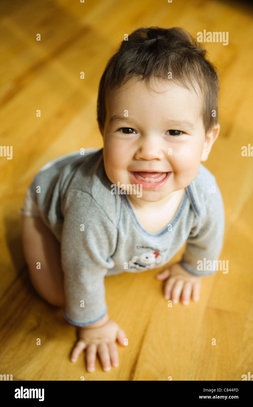 Person crawling on hands and knees hires stock photography and images