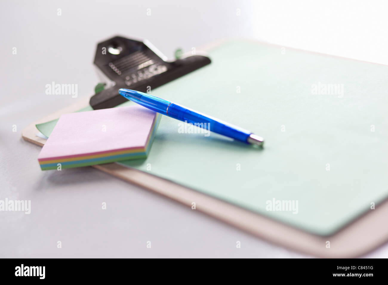 Clipboard, postit notes, and pen Stock Photo Alamy