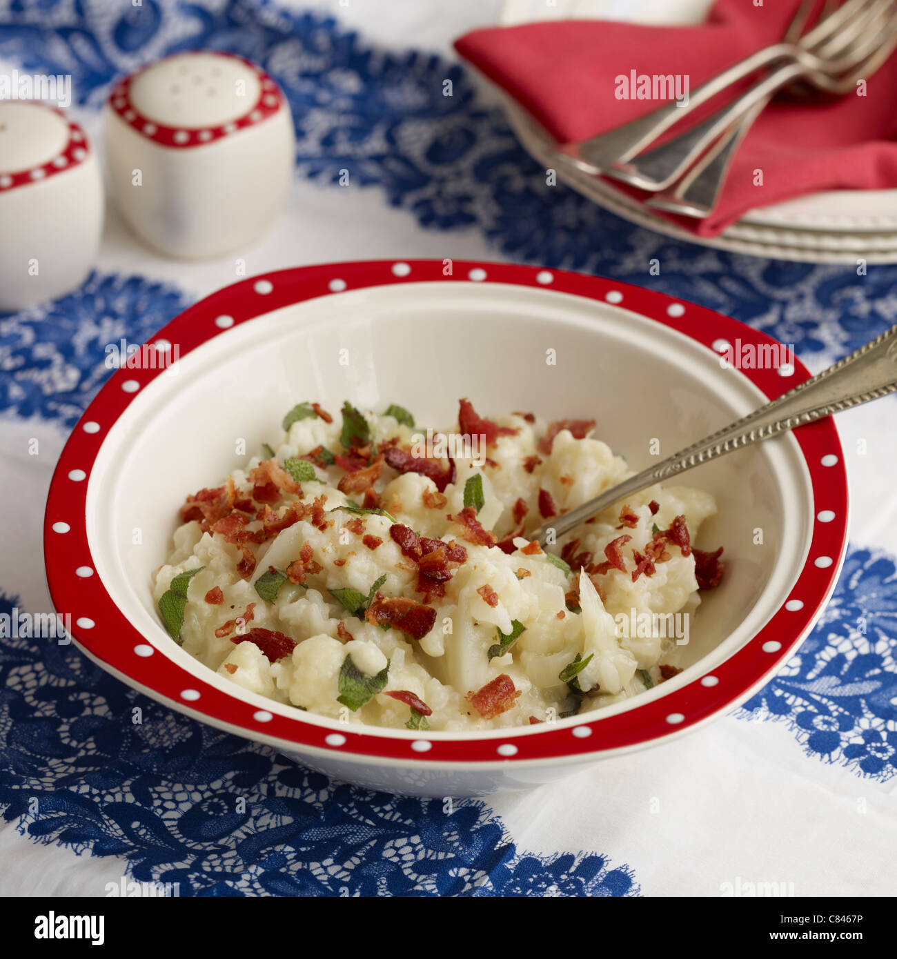 Bowl of cauliflower bacon risotto Stock Photo
