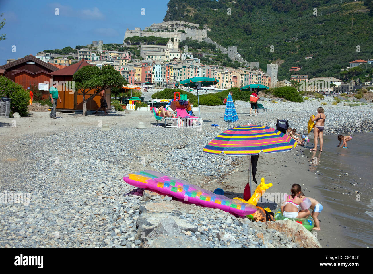 People at beach of Palmeria, tiny island next to Porto Venere, province La Spezia, Liguria di Levante, Italy, Mediterranean sea, Europe Stock Photo