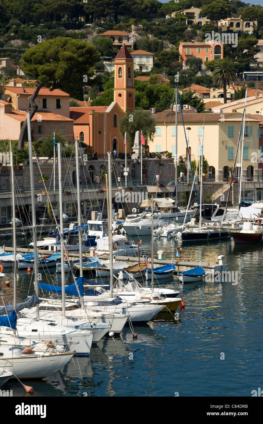 St. Jean Cap Ferrat, harbour with church in background Stock Photo - Alamy