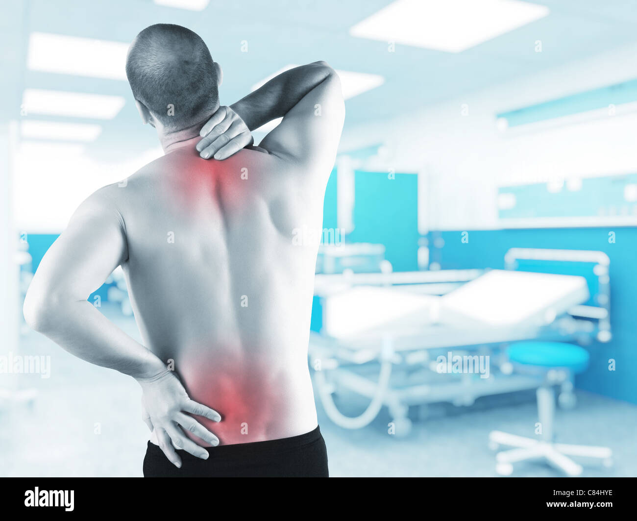 man with back problem in hospital Stock Photo