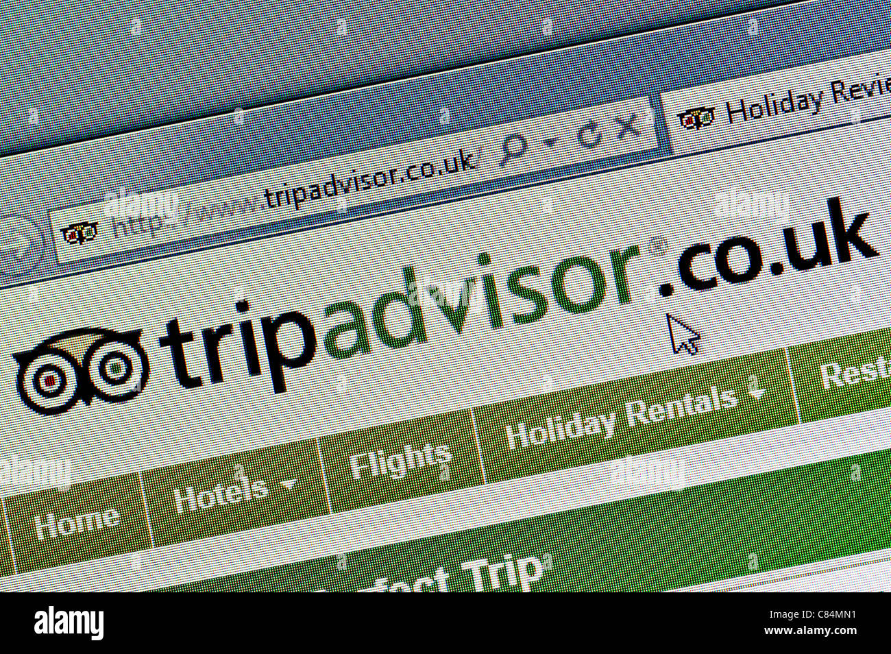 Trip Advisor / Tripadviser UK logo and website screen close up Stock Photo