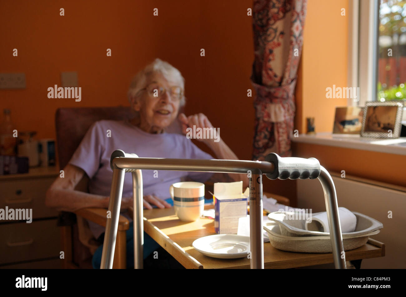 Elderly women walking frame hi-res stock photography and images - Alamy