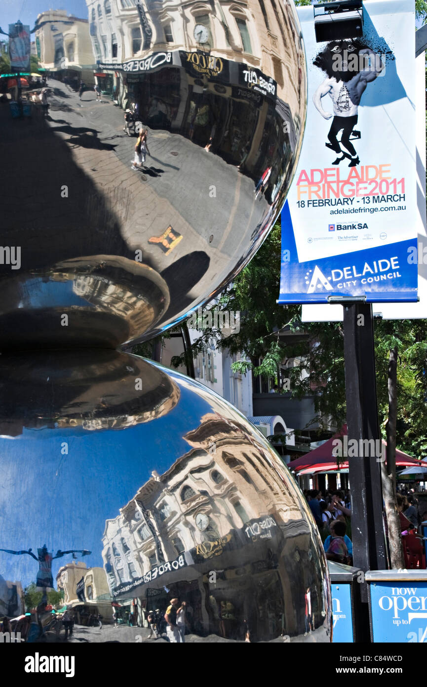 Reflections of the Rundle Mall Shopping Street in Large Mirror Balls in