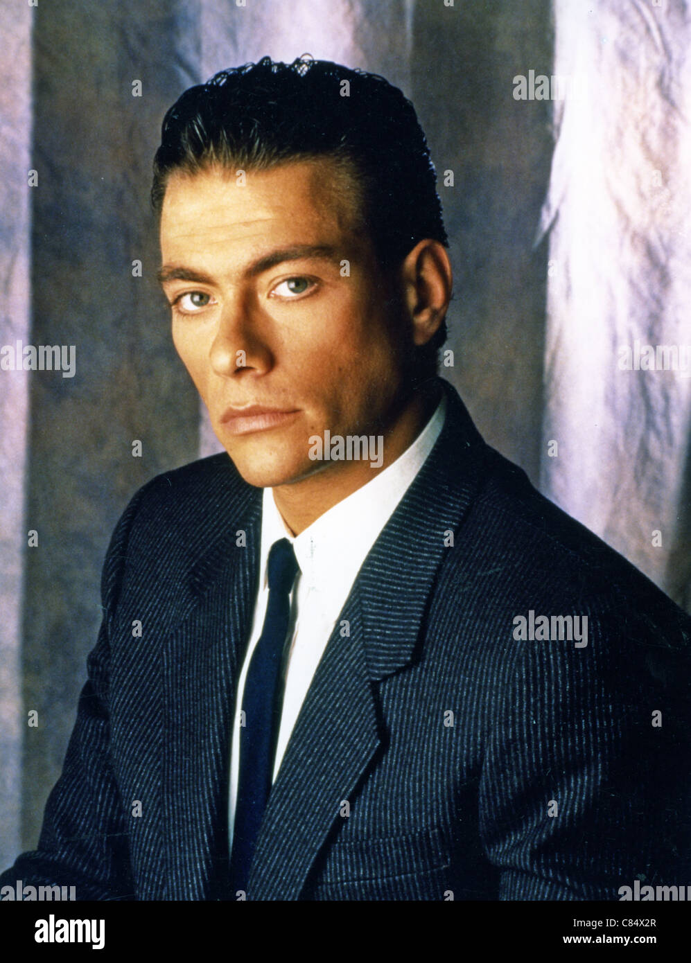 JEAN-CLAUDE VAN DAMME  Promotional photo of Belgian film actor about 1995 Stock Photo