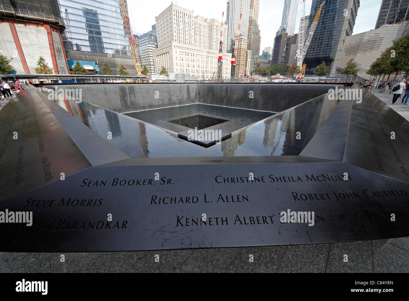 Wide angle view of one of the Twin Towers footprints at 9/11 Memorial