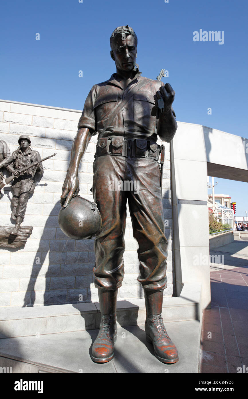 Soldier holding dog tags at Korean War Memorial in Atlantic City, NJ Stock Photo