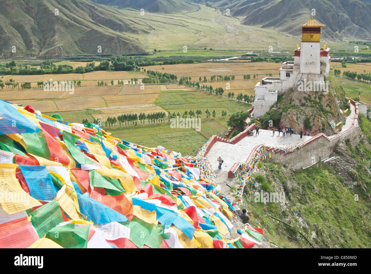 Yumbulagang with prayer flags Stock Photo
