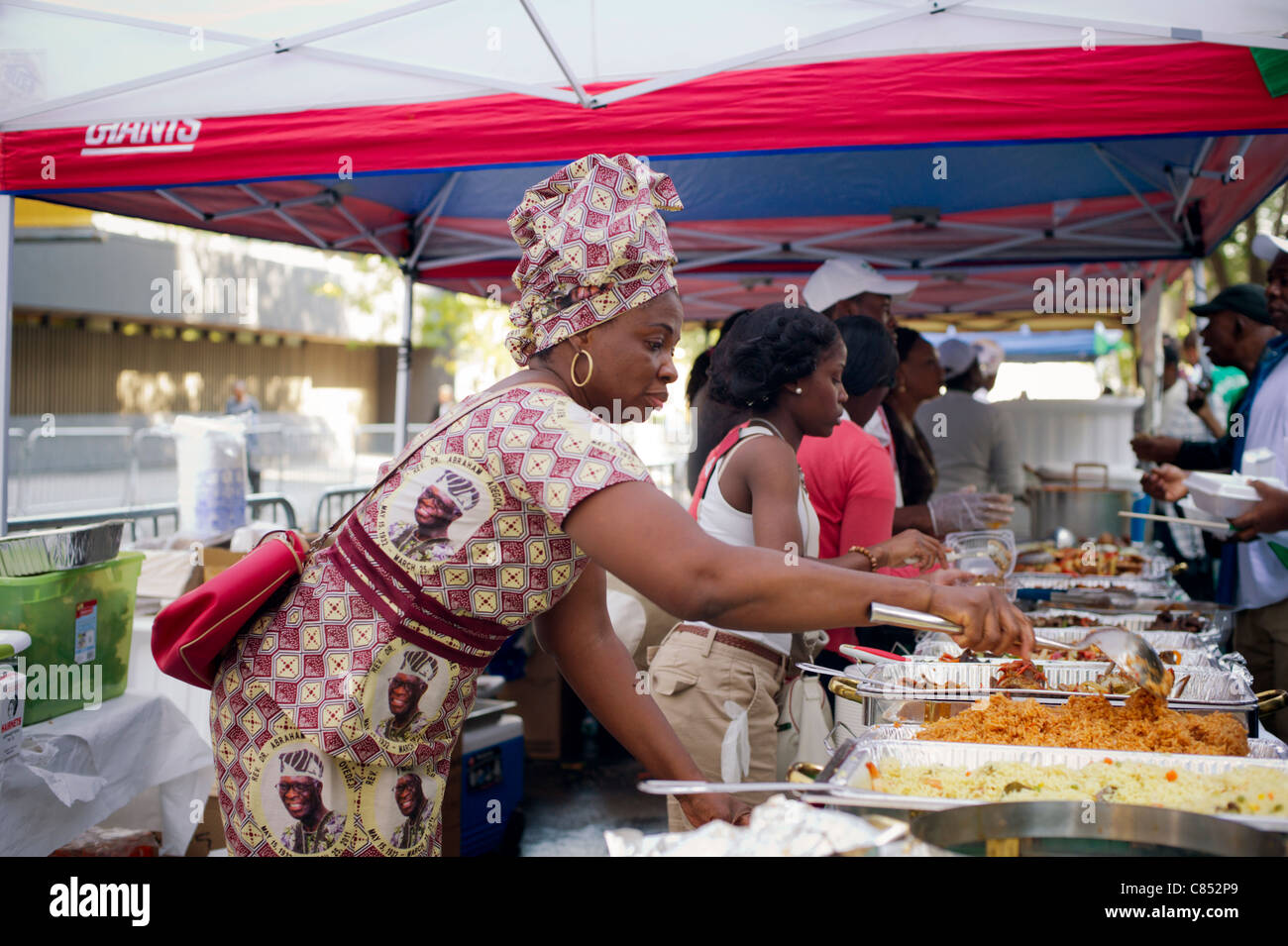 Traditional Nigerian food is sold at a street fair following the
