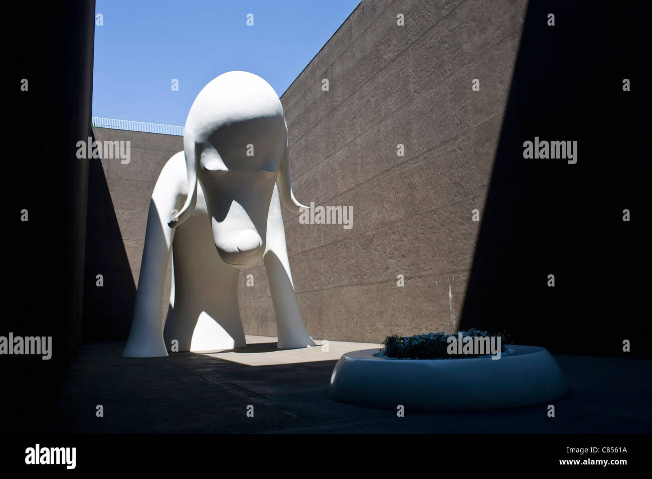 Photo shows Aomori Ken, an 8.5 meter tall statue of a dog designed by Yoshitomo Nara in the courtyard of the Aomori Museum of Art in Aomori City, Aomori Prefecture, Japan on 11 July, 2001. Stock Photo