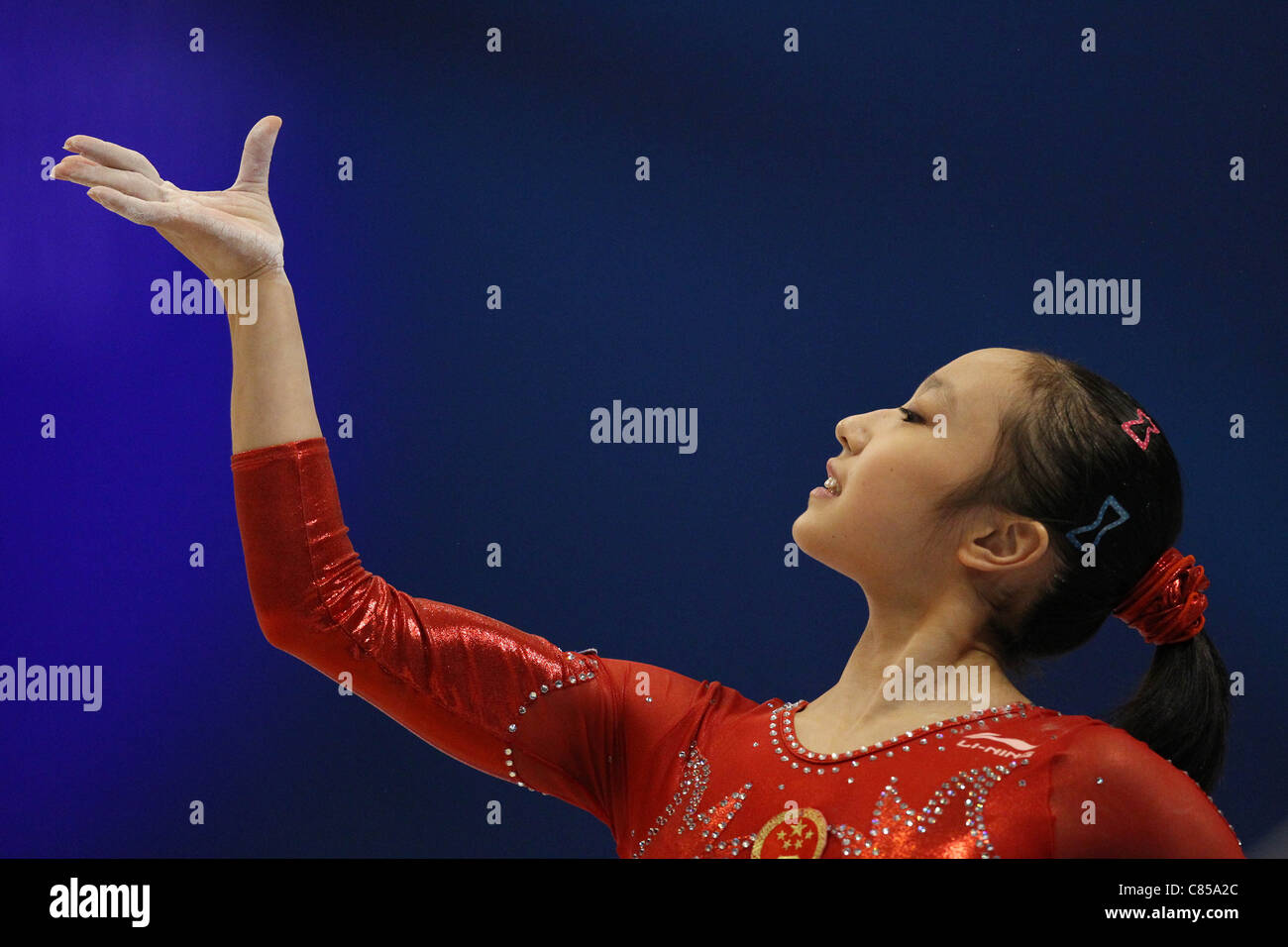 Huang Qiushuang (CHN) performs during the 2011 World Artistic Gymnastics Championships in Tokyo, Japan. Stock Photo
