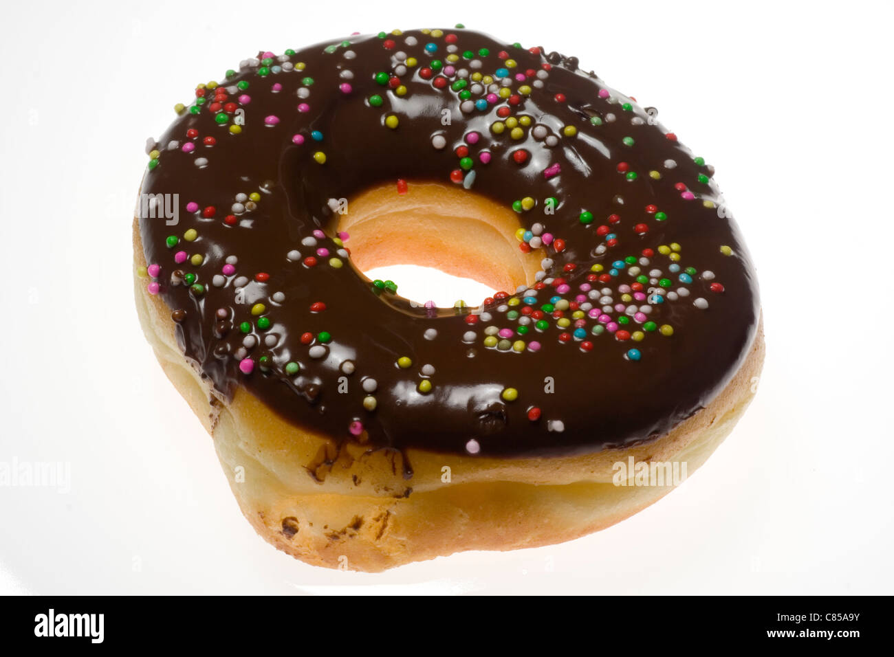 Chocolate coated donut isolated on white background Stock Photo - Alamy