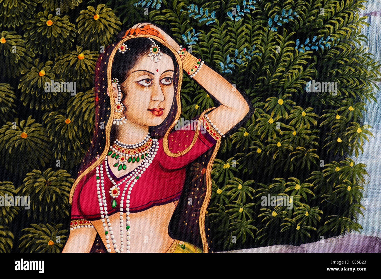 Traditional Indian oil painting on canvas of an Indian woman Gopi Stock Photo