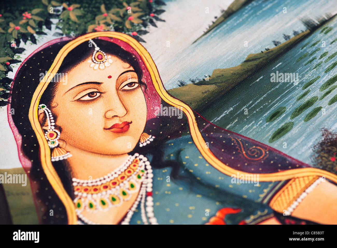 Traditional Indian oil painting on canvas of an Indian woman Gopi Stock Photo