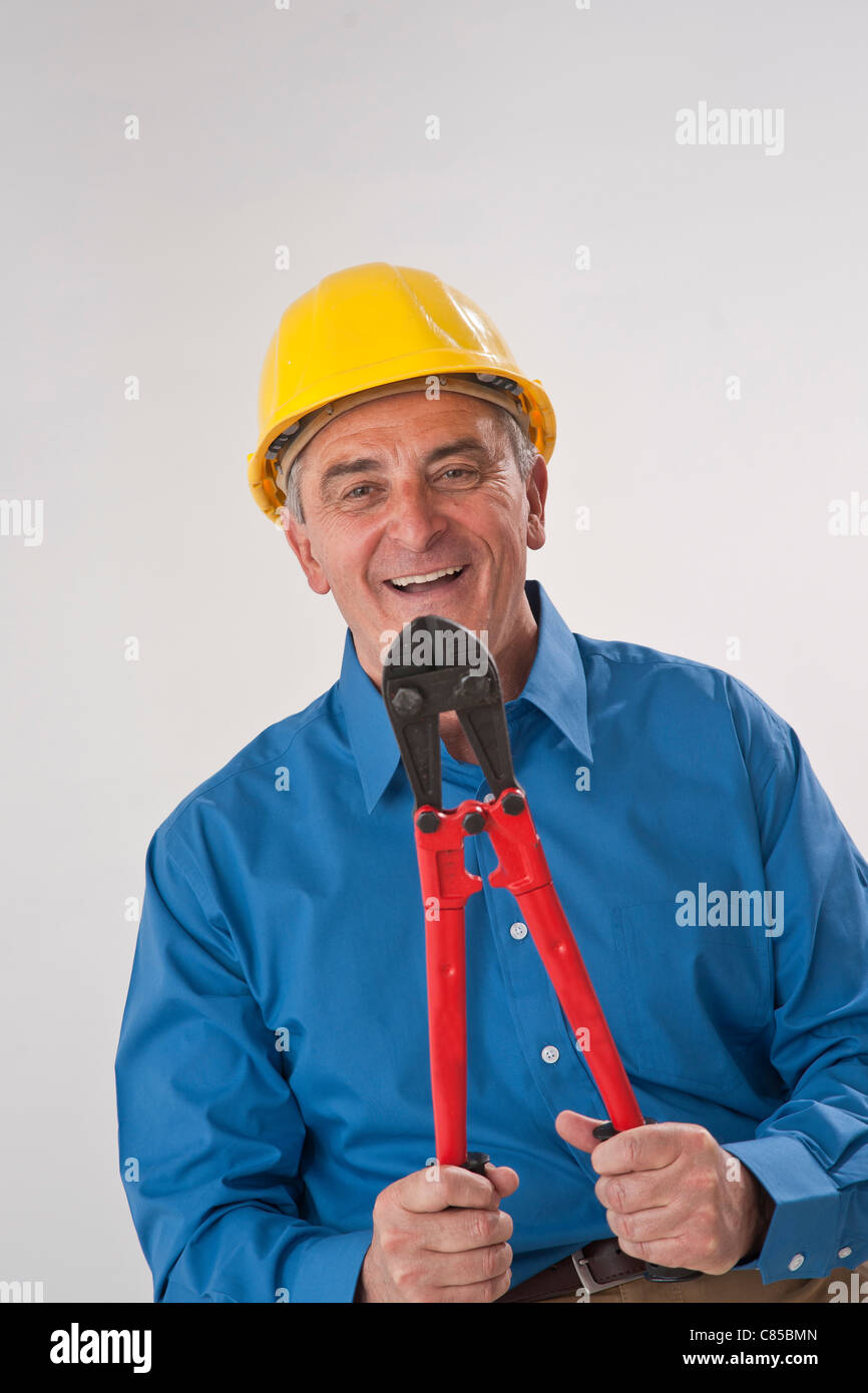 Man Holding Lock Cutter Stock Photo