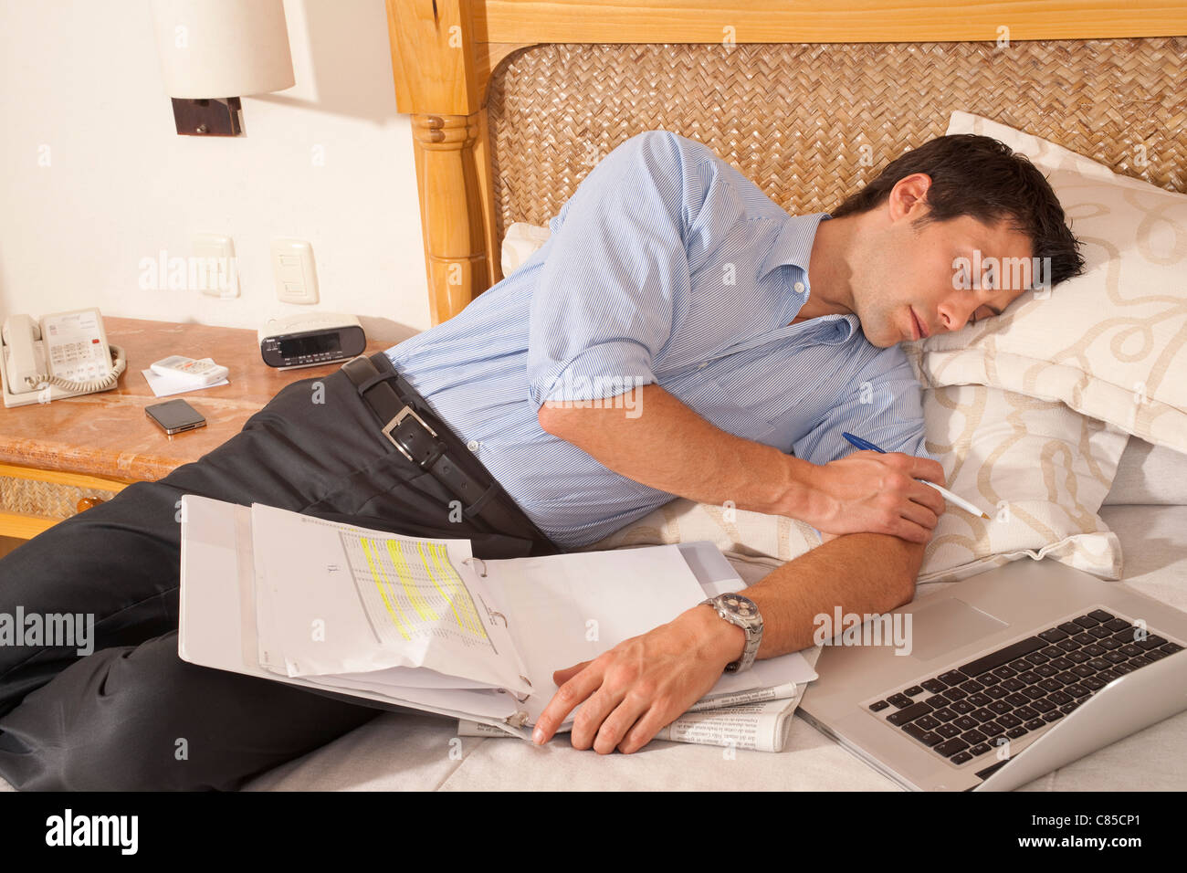 Man using Laptop in Hotel Room, Reef Playacar Resort and Spa, Playa del Carmen, Mexico Stock Photo