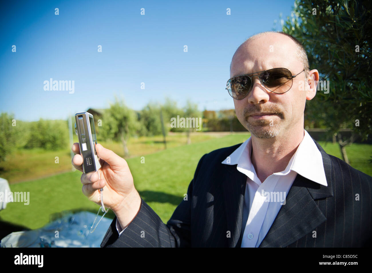 Man taking Pictures at Wedding Stock Photo