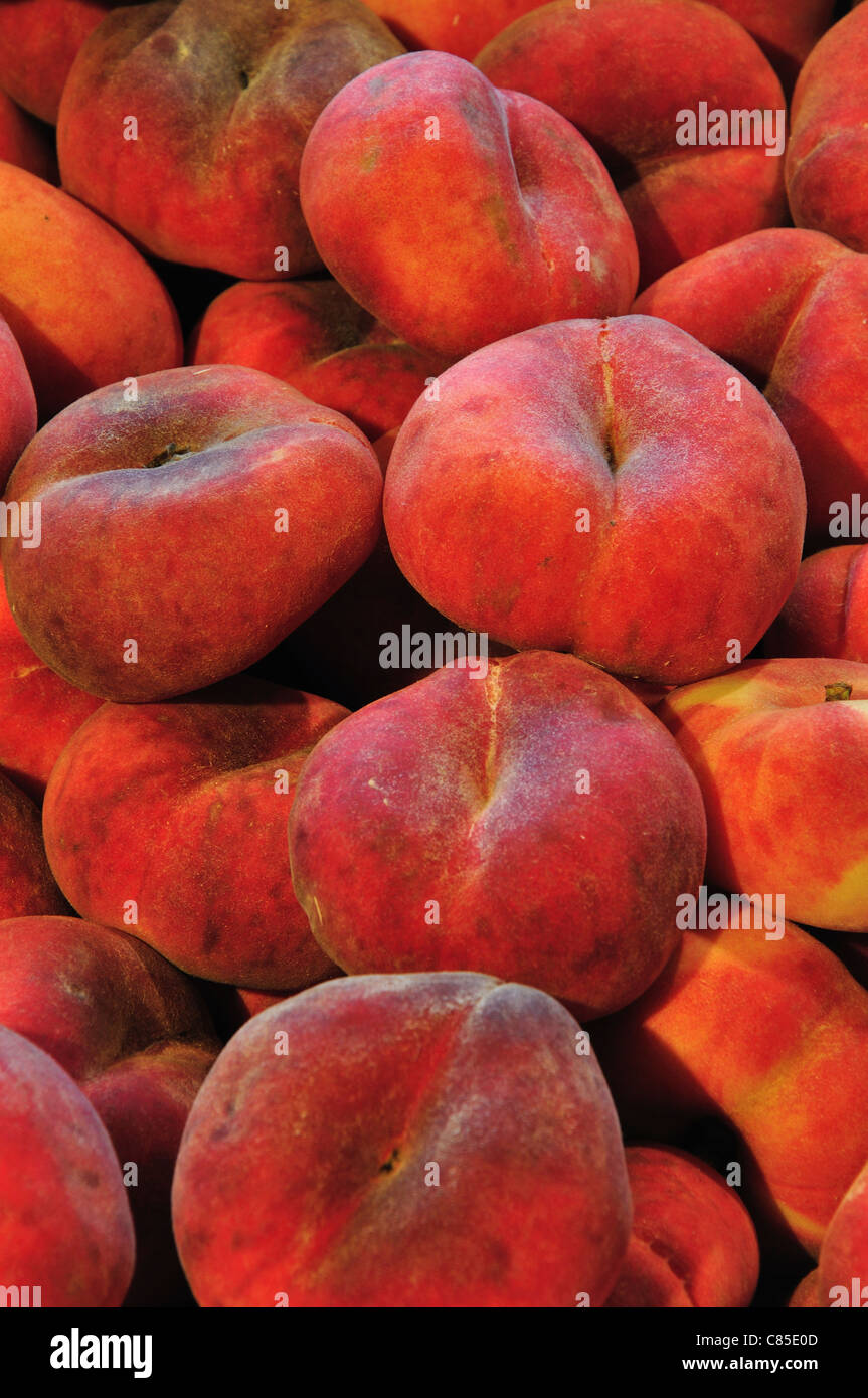 Doughnut peaches an unusual fruit Stock Photo Alamy