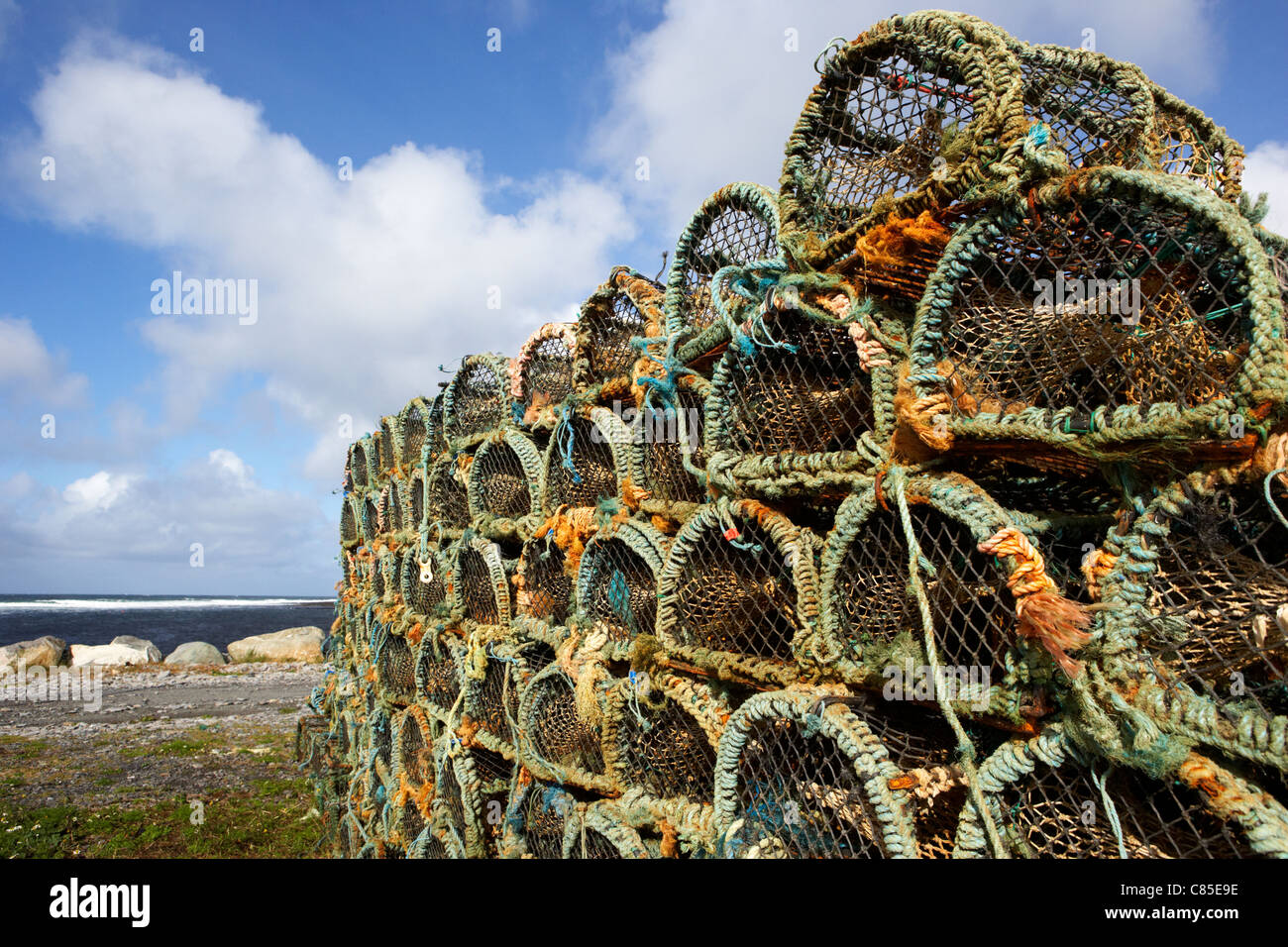 pile of lobster pots stacked in the west coast of ireland Stock Photo