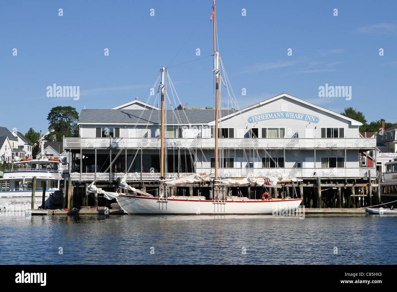 Schooner EASTWIND moored in front of Fisherman's Wharf Inn Stock Photo