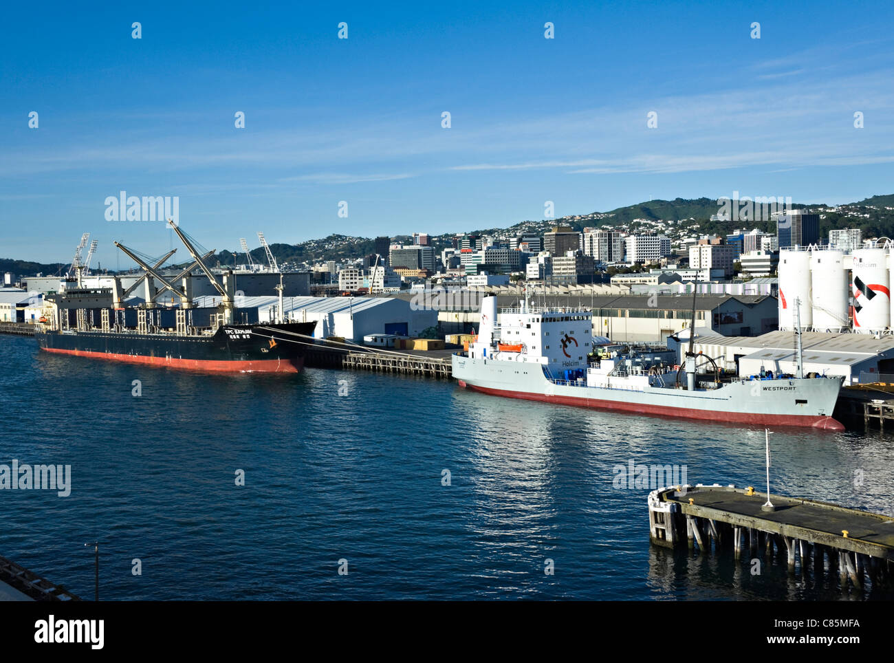 The Cement Carrier Westport Docking and Bulk Carrier TPC Samjin Docked at Wellington Harbour North Island New Zealand NZ Stock Photo