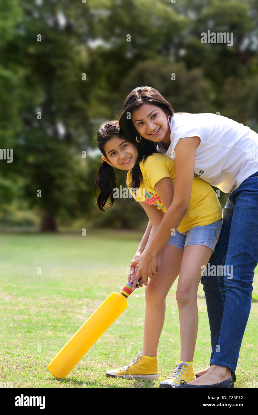 children playing cricket stock photos children playing cricket children playing