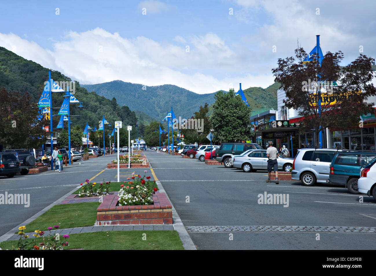 The Wide High Street with Central Gardens Lined with Trees Picton South Island New Zealand NZ Stock Photo