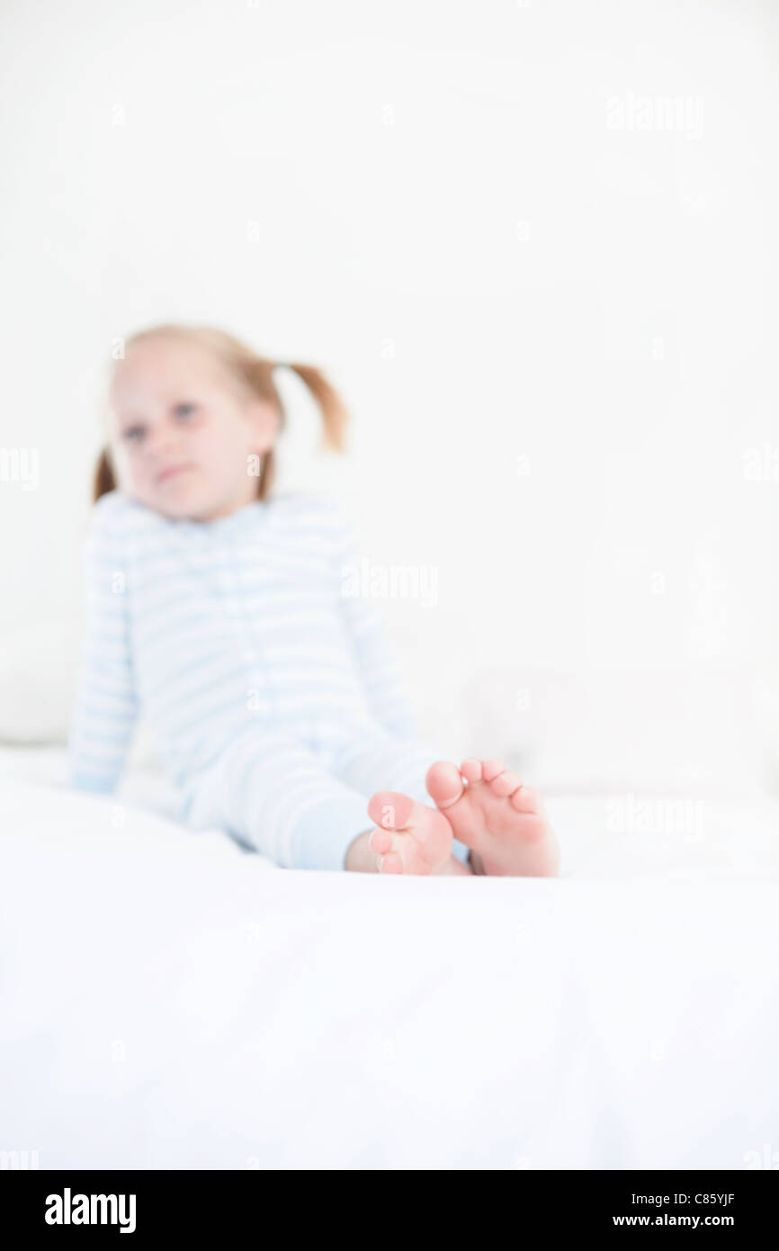 Little girl in her pajamas Stock Photo