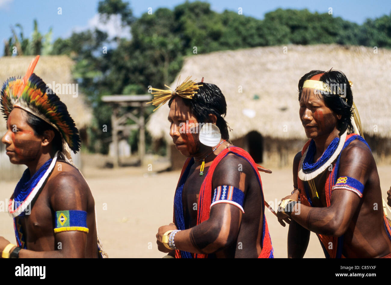 Bacaja village, Amazon, Brazil. Young men dancing with artifacts during the hornets' nest initiation ceremony; Xicrin tribe. Stock Photo