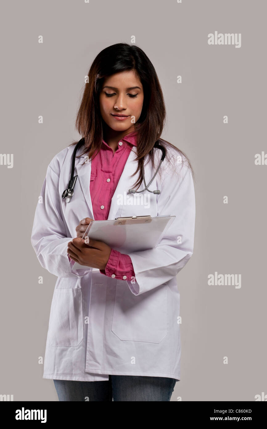 Female doctor with a clip board Stock Photo