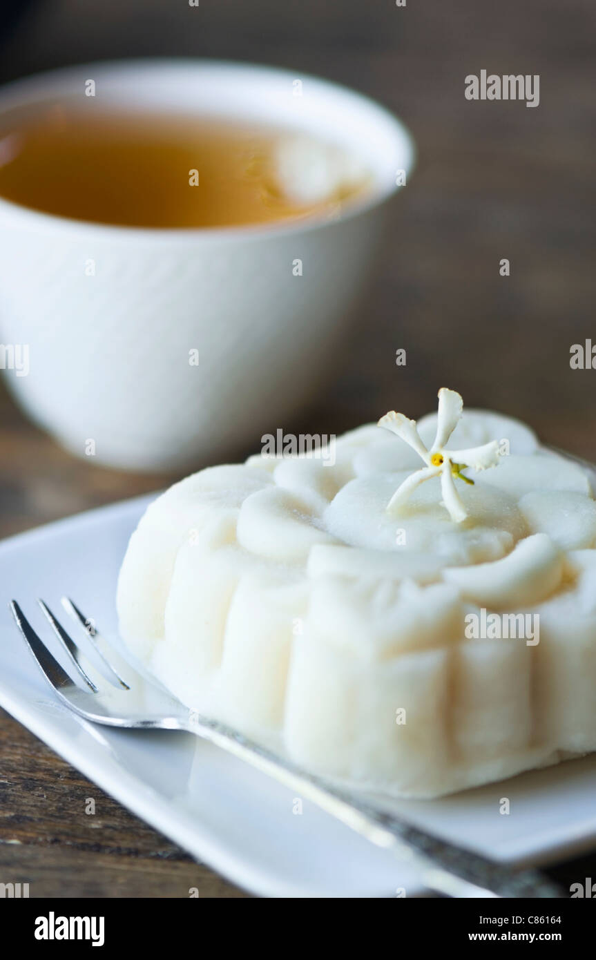 Close up of jasmine tea and rice cake Stock Photo
