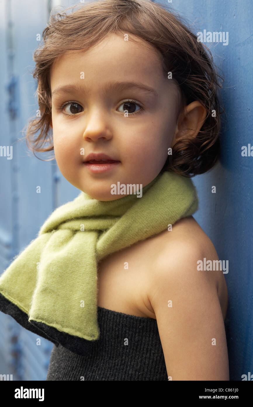 Child wearing a sweater scarf Stock Photo