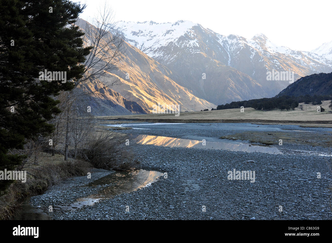 View up the west branch of the pebble bedded Matukituki River looking toward Mt Aspiring National Park. Stock Photo