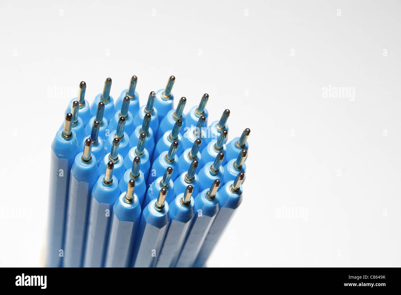 image of blue biro pens against white background Stock Photo Alamy
