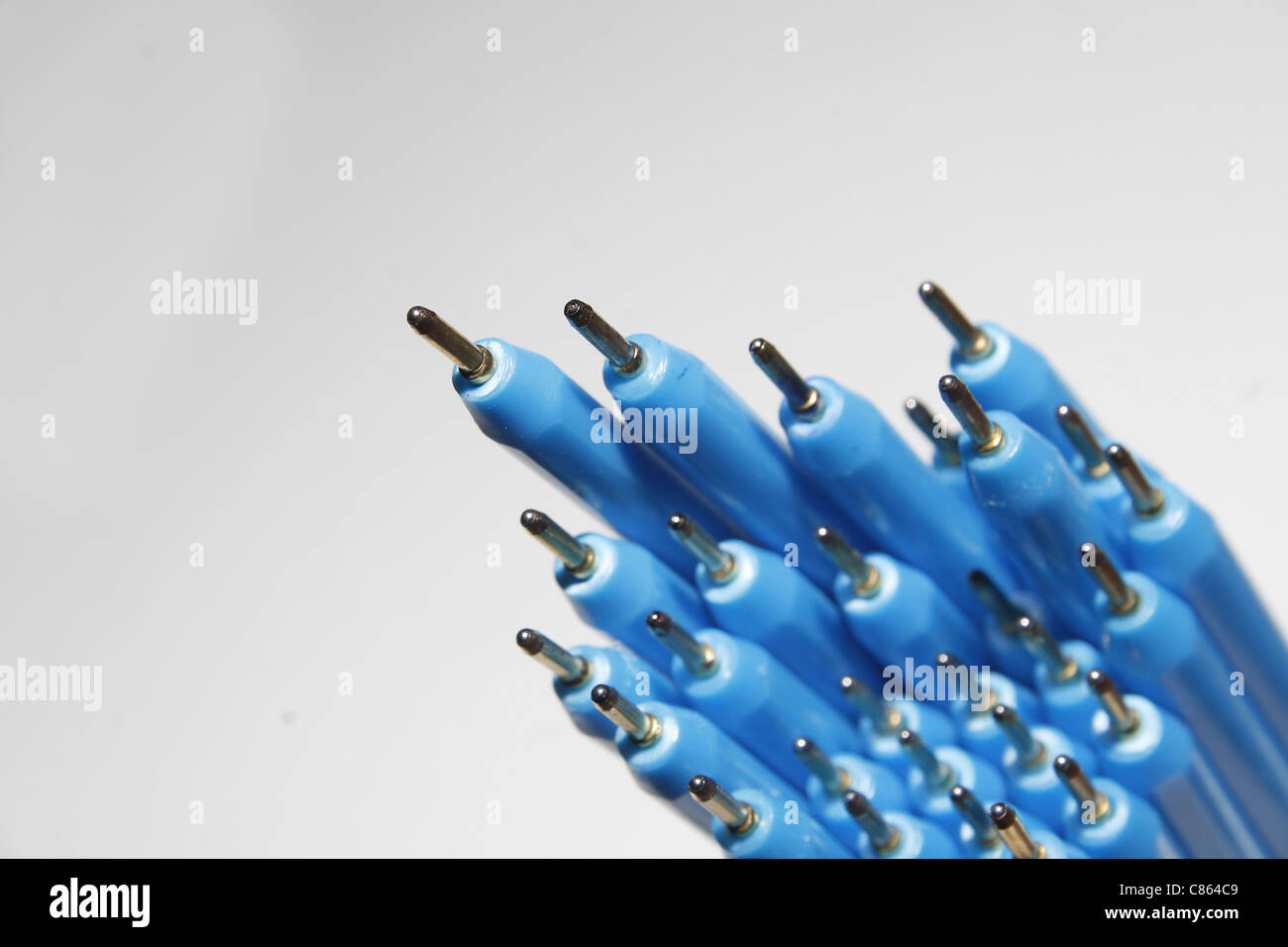 image of blue biro pens against white background Stock Photo Alamy