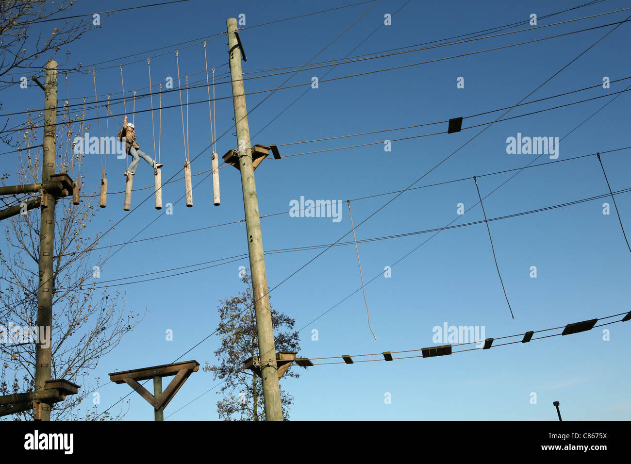 Aerial Extreme’s High Ropes Adventure Courses at Willen Lake in Milton Keynes, England, UK. Stock Photo