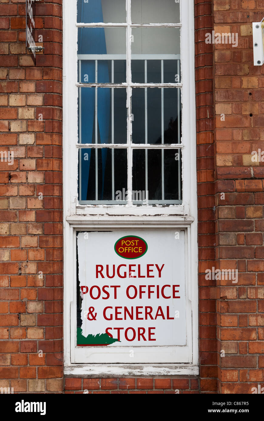 sign for rugeley post office and general store in rugeley, staffordshire Stock Photo
