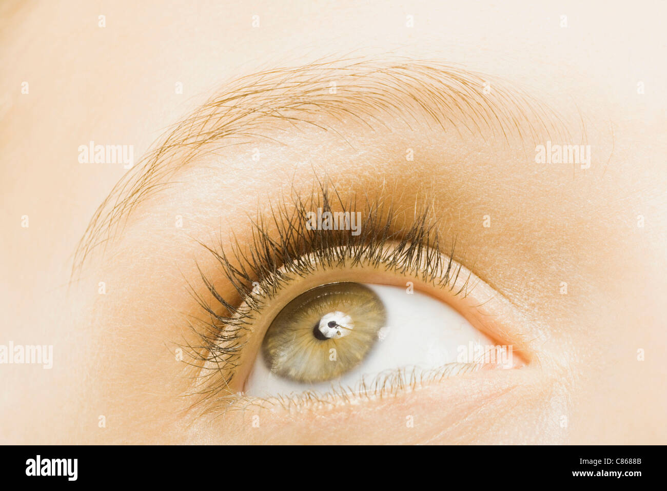 Woman's eye, looking up Stock Photo