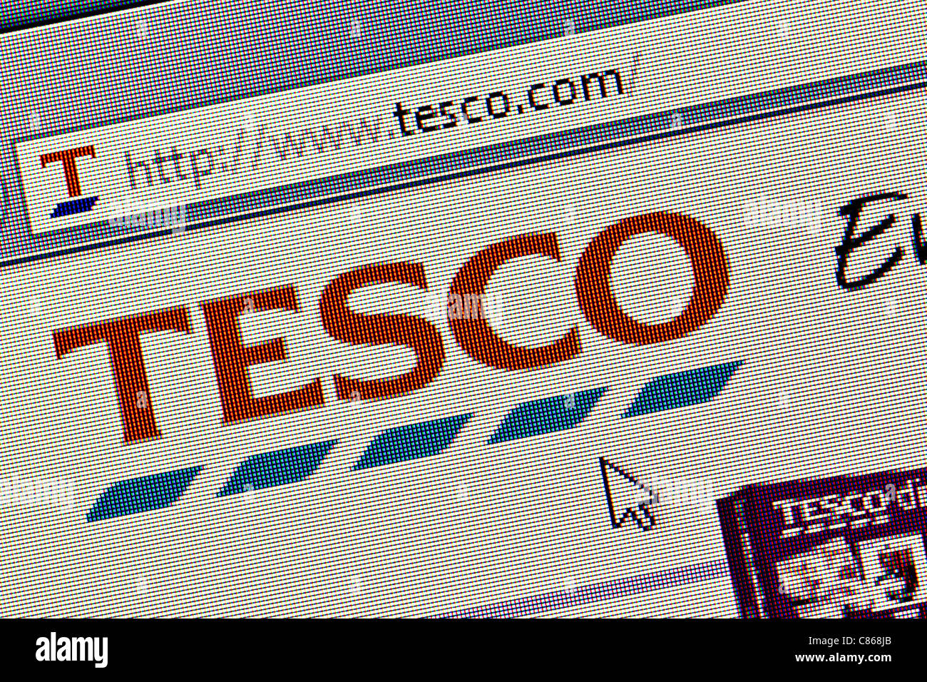 Tesco supermarket logo and website close up Stock Photo